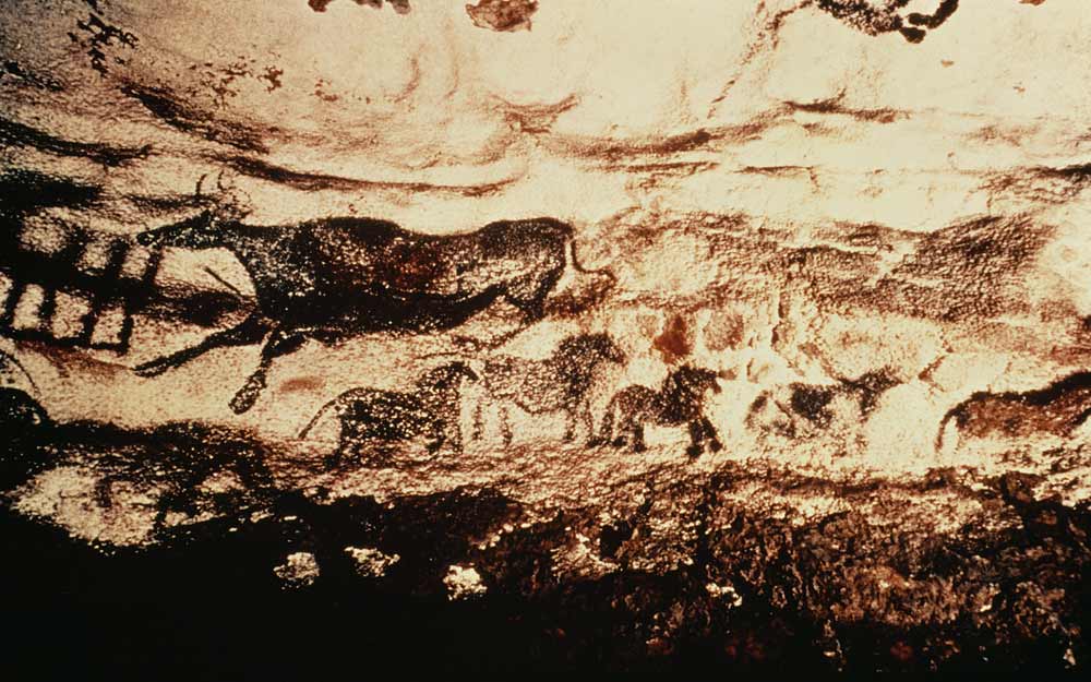 Rock painting of a leaping cow and a frieze of small horses from Anonymous