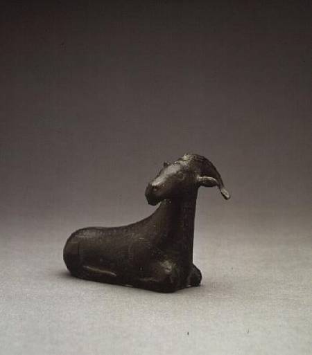 Bronze figure of a recumbent goat from Anonymous