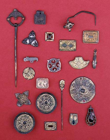 Collection of Anglo-Saxon and Celtic jewellery including gilt bronze mountssaucer and cruciform broo from Anonymous