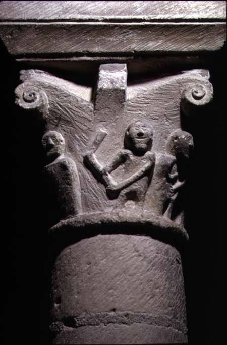 Column capital depicting several figures, one with an axe, from the crypt,Norman from Anonymous