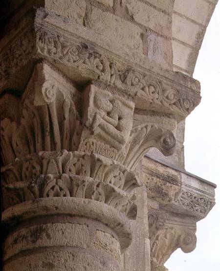 Column capital with stylised foliage designs around the figure of an acrobatfrom the porch exterior from Anonymous