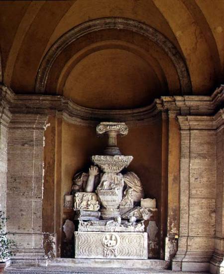 The inner courtyard detail of a niche displaying a collection of fragmentary antique sculpture from Anonymous