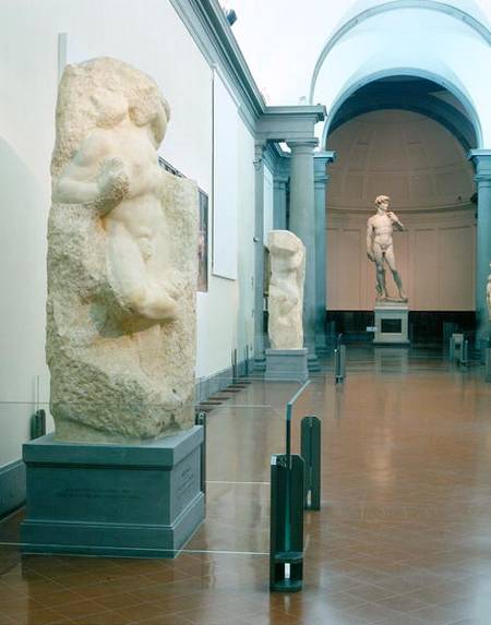 Interior view of the gallery with Michelangelo's 'Awakening Slave' and 'David' in the background (ph from Anonymous