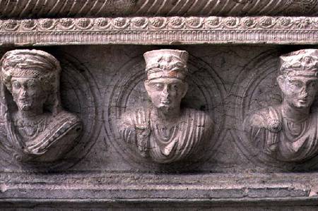 Three Palmyrian busts on a sarcophagus from Anonymous