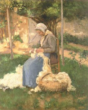 Bäuerin beim Wollezupfen