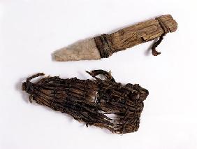 Dagger and scabbard found with the Oetzi Iceman (bast, leather, ash wood and flint)