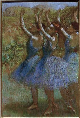 Three dancers in blue
