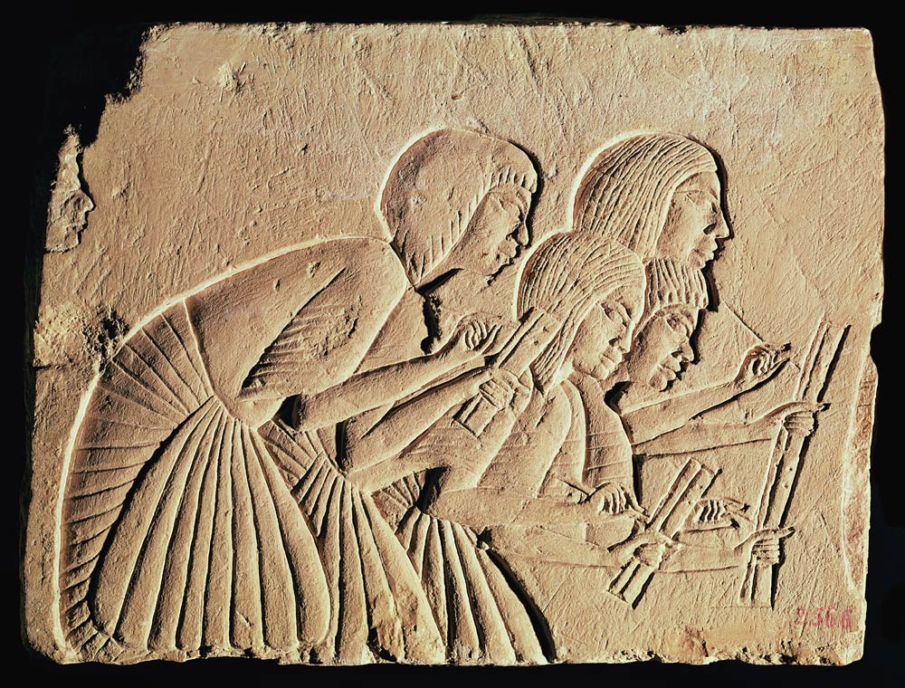 Tablet depicting four scribes at work, New Kingdom from Egyptian