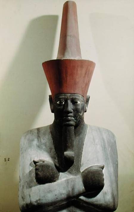 Detail of a statue of Mentuhotep II, enthroned and wearing the red crown of Lower Egypt, taken from from Egyptian