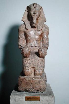 Kneeling statue of Amenhotep II (1427-1392 BC) holding offerings of wine, from Thebes, New Kingdom