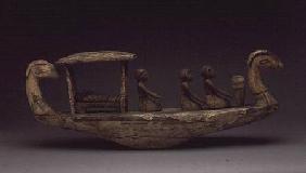 Tomb model of a boat, with a mummy on a bier under a canopy with three male crew, with a mummy on a