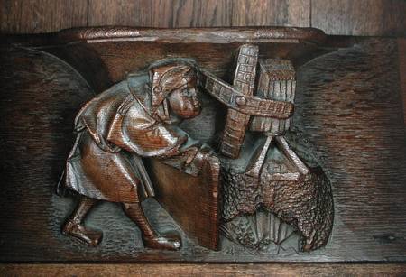 Carving of a miller, from a choir stall from French School
