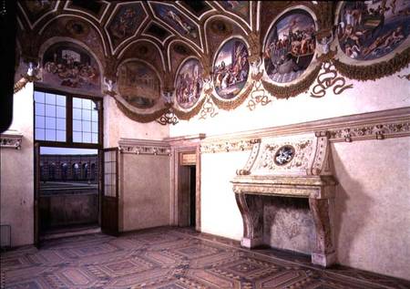 View of the Camera dei Venti, showing the stucco fireplace and frieze with zodiac roundels above from Giulio Romano
