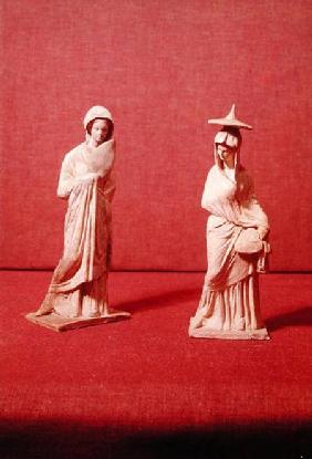 Two statues of standing women, from Tanagra