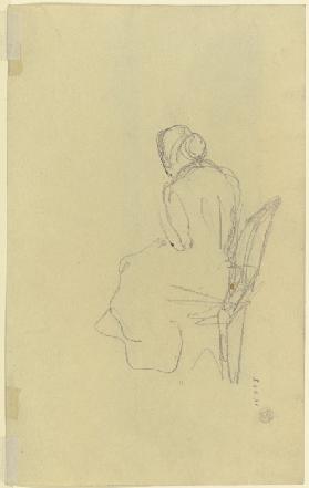 Rückenfigur einer sitzenden Frau