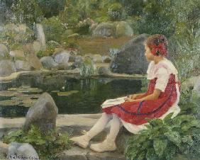 Mädchen an einem Teich