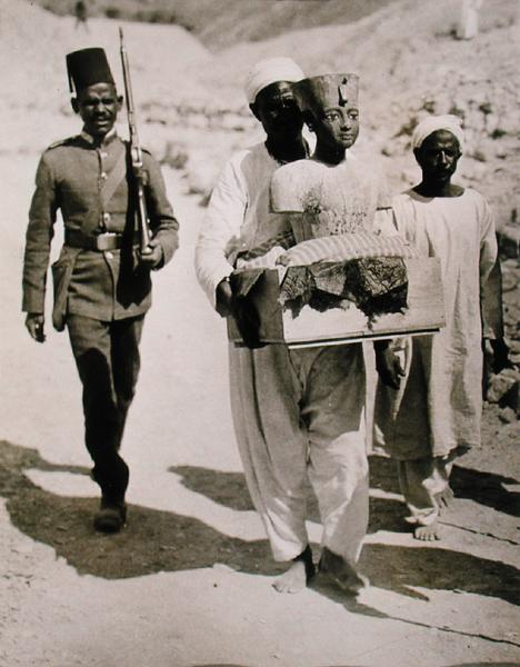 The mannequin or bust of Tutankhamun being carried from the tomb, Valley of the Kings, 1922 (gelatin from Harry Burton