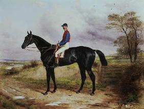Earl Poulett's "The Lamb" , Winner of the Grand National, with Mr.George Ede