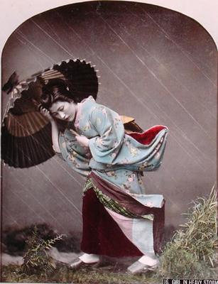 Young Japanese Girl in the Rain, c.1900 (hand coloured photo) from Japanese Photographer (20th century)