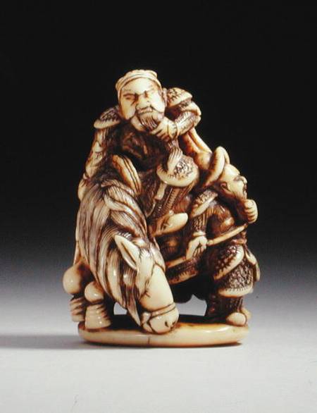 Netsuke in the form of a Chinese warrior on horseback with his attendant from Japanese School