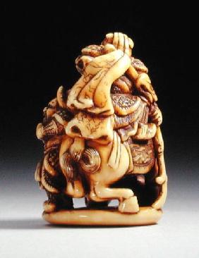 Reverse side of a netsuke in the form of a Chinese warrior on horseback with his attendant