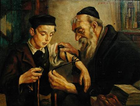 A Rabbi tying the Phylacteries to the arm of a boy from Jewish School