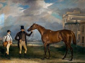 General Chasse, a chestnut racehorse being held by his trainer, with his jockey, J. Holmes standing