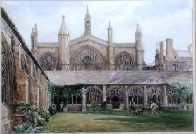 New College cloisters with gardener