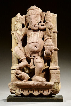A Central Indian, Rajasthan, Red Sandstone Figure Of Ganesha Standing With His Right Leg On His Vehi from 