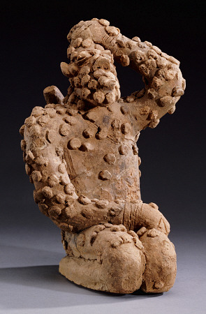 A Djenne Terracotta Kneeling Male Figure, 14th Century from 