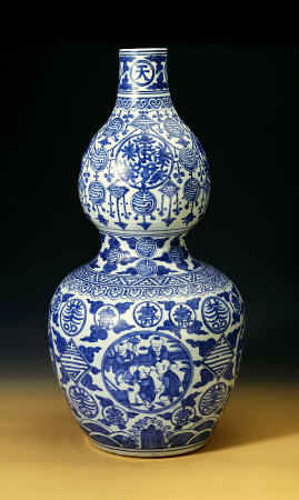 A Large Ming Blue And White Double Gourd ''Shou'' Vase, Depicting Young Boys Playing On A Terrace from 