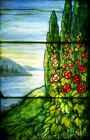 A Mountainous Lake Scene With Red Blossoming Hollyhocks And Arbor Vitae Painted And Leaded Glass Lan from 