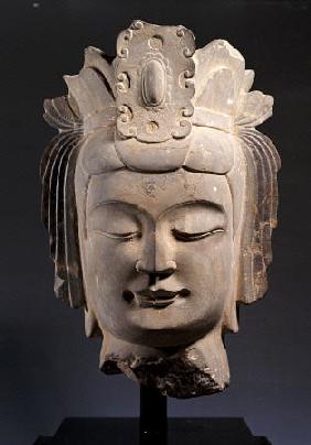 A Limestone Head Of A Bodhisattva Carved With Serene Expression