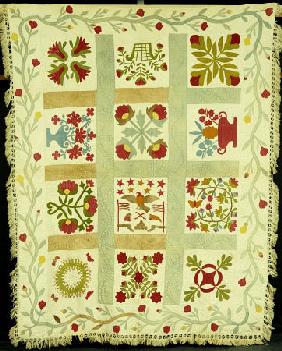 An Appliqued And Stuffed Cotton Quilted Coverlet