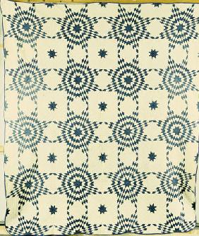 A Pieced And Appliqued Cotton Quilted Coverlet