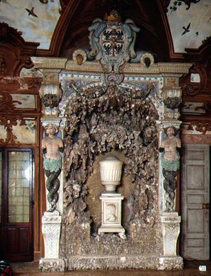A grotto, possibly designed for Isabella d'Este (d.1538) consisting of an urn on a pedestal flanked from 