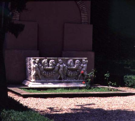 Ancient sarcophagus decorated in high relief and set in the gardens, from the collection of Cardinal from 