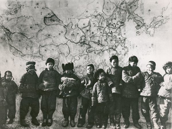 Chinese children in front of a mural, 1933 (b/w photo)  from 