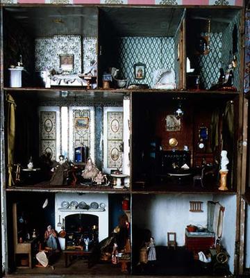 Doll's house showing original wallpapers and furnishings from 