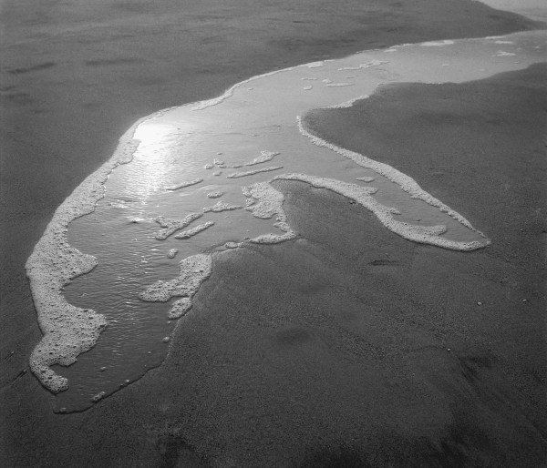 Foam water on sand, Porbandar (b/w photo)  from 