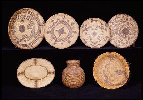 Four Apache Coiled Trays, A Chemehuevi Polychrome Coiled Tray, An Apache Polychrome Coiled Jar, Olla