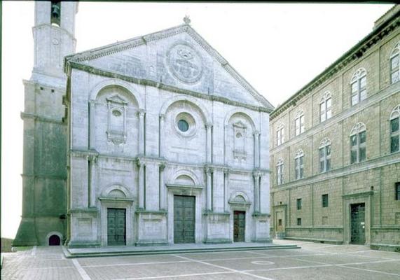 Facade of the Cathedral designed by Bernardo Rossellino (1409-64), the pediment bearing the papal ar from 
