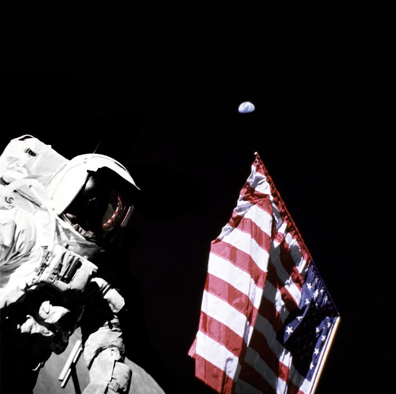 Geologist-Astronaut Harrison Schmitt, Apollo 17 Lunar Module pilot, is photographed next to the Amer from 