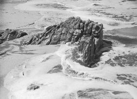 Rock on wet sand, Porbandar II (b/w photo) 