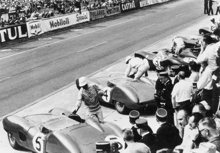 Start of the Le Mans 24 Hours, France, 1959. Roy Salvadori prepares to climb aboard his Aston Martin from 