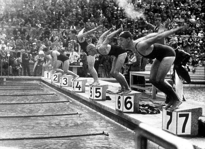 swimming competition at berlin Olympic Games: here swimmers diving in swimmming pool from 