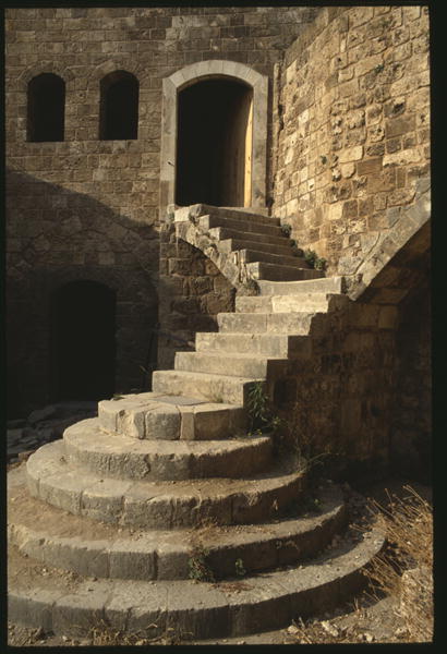 The castle of Saint-Gilles, detail, view of a stair (colour photo)  from 