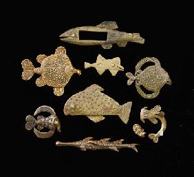 Thirty-Six Akan Brass Goldweights Cast As Fish In Varying Forms