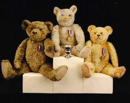 Three Farnell Teddy Bears On A Medal Winners Plinth from 