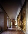 The main corridor on the piano nobile decorated with hanging tapestries, designed by Antonio da Sang